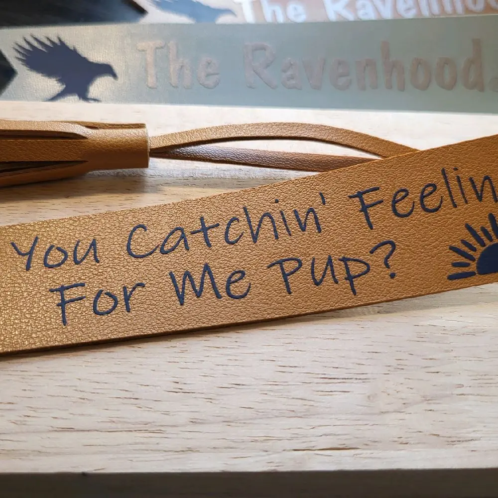 Ravenhood Sean Roberts Leather Bookmark - Licensed Bookish Merch Gift Bookmark Featuring "Catchin' Feelin' for Me Pup?" by Sean Roberts