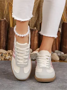 A pair of women's all-season German training shoes, retro color-block casual sneakers, breathable and comfortable white shoes for students