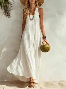 Women’s summer dress with a relaxed Bohemian beach vacation vibe—loose fit that flatters the figure and is comfortable, long length.