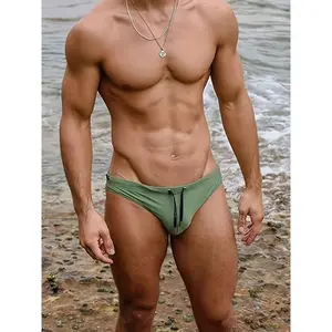 Men's triangle solid color sexy swimming sports beach pants tight anti-slip anti-embarrassment tethered swim shorts