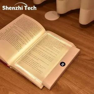 Rechargeable transparent LED flat reading lamp with timer and adjustable light panel, suitable for reading entire pages of books at night on the bed. It can be charged via USB. An interesting gift for readers, family members, and friends.