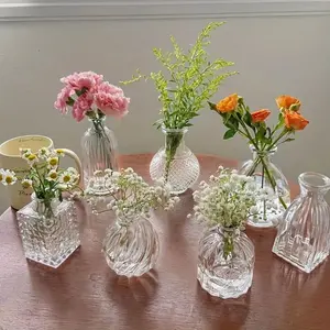 7-Piece Glass Vase Set — Vintage Clear Transparent Glass Bud Vases, Crystal-Style Mini Floral Flower Decor Vases, Retro-Inspired Small-Mouth & Short-Neck Vases — Multi-Cultural Aesthetic Wedding Table Centerpiece Vase Decor
