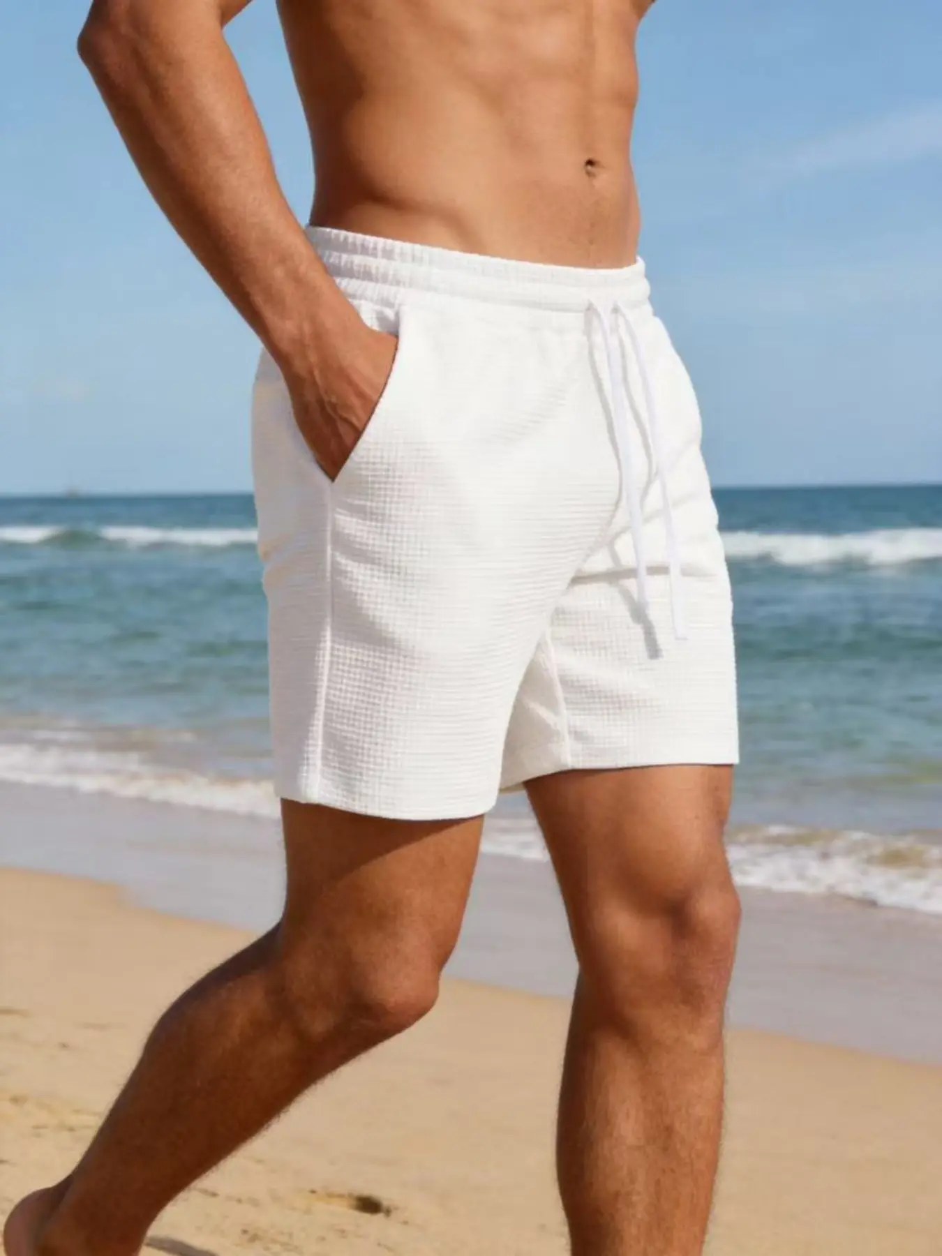 Men's waffle-style beach shorts, Elastic Loose Shorts, featuring elastic drawstring waist and leg drawstrings. Suitable for vacations and casual wear. Can be used as home wear, casual outdoor outfits and summer daily wear.