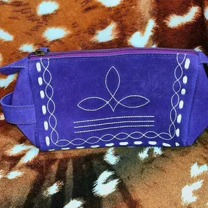 Purple suede toiletry case