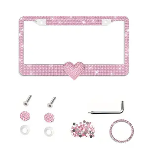This love heart bling license plate frame is covered in full pink crystal rhinestone glitter, comes in multiple colors, includes a complete accessory set with anti-rust hardware, fits US standard plates, and adds a sweet sparkle to any car exterior