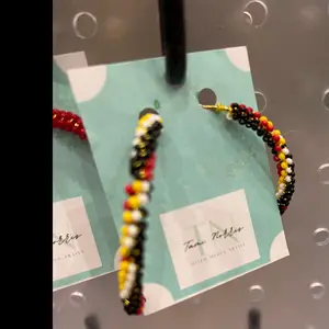 Indigenous beaded hoop earrings.