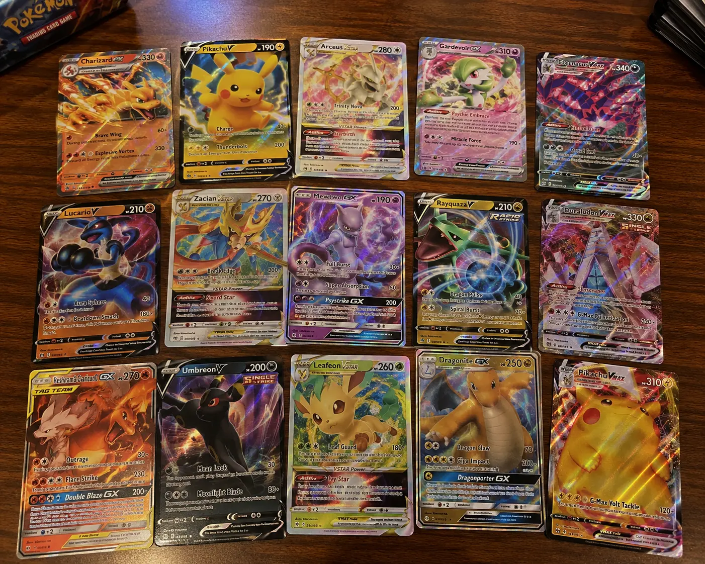 10 Pokémon Cards including at least 1 EX, V, VSTAR, VMAX