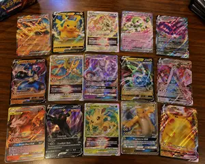 10 Pokémon Cards including at least 1 EX, V, VSTAR, VMAX