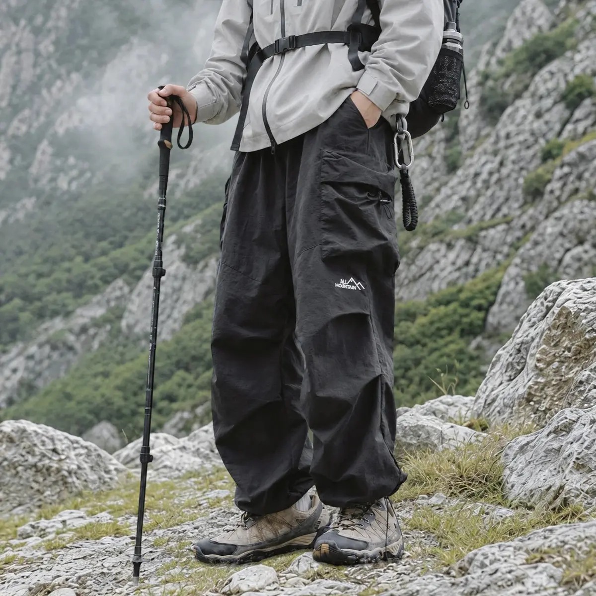Unisex loose cargo parachute pants—lightweight, waterproof outdoor hiking long pants with a relaxed street-style fit, suitable for both men and women.