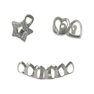 Bottom open-face silver grillz paired with a top single-tooth star and heart grillz. Made with durable silver-plated metal, they come with adjustable molding bars for a secure, comfortable fit on most teeth sizes.