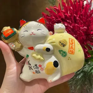 **New Year Lucky Charm |   Yakushigama “Wishes Fulfilled” Maneki-neko with Money Bag**#7892 Approx. 5.1 × 5.1 × 2.8 inches.