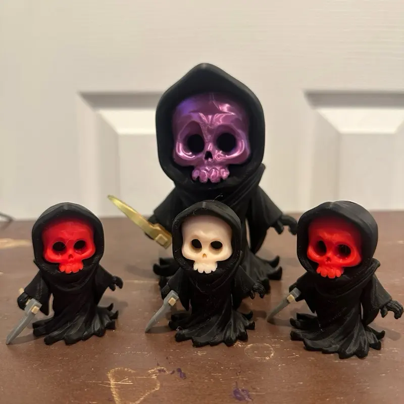 Articulating Grim Reaper Figurine Collection - Purple & Red Skulls with Gold & Silver Swords - Spooky Halloween Ornaments for Play and Decoration
