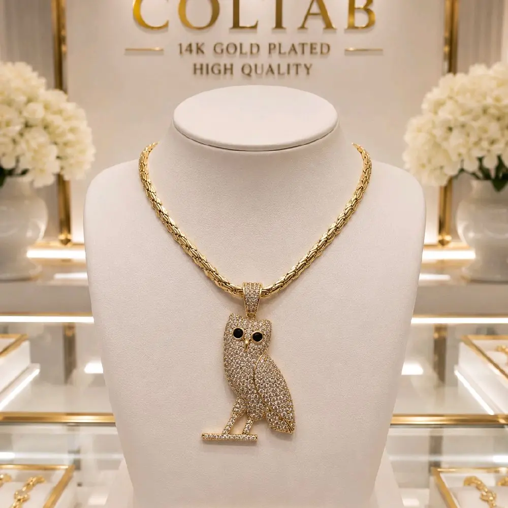 (109) owl pendant 14k Goldplated  22 inch chain.