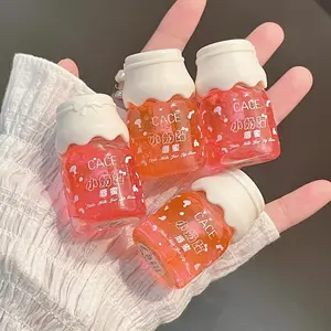 Set of 4 small milk bottle fruit-flavored lip glosses, Hydrating Lipgloss, moisturizing and hydrating lips, can be layered for a jelly-like lip effect, glossy and shiny, suitable for gifts and easy to carry, Moisturizer