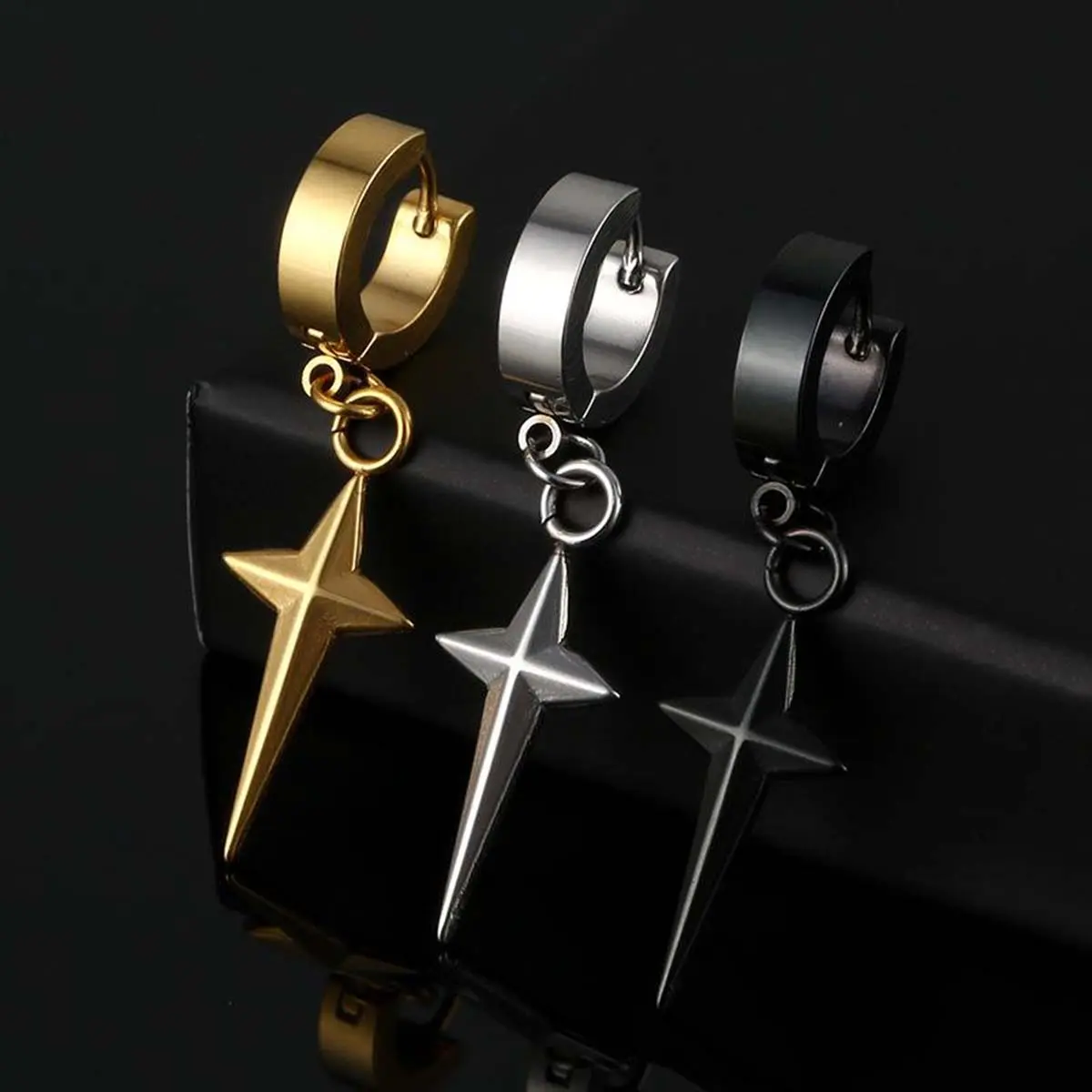 Simple and fashionable small star earrings four-pointed star trend retro hip-hop style male and female couple accessories