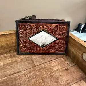 Handcrafted Leather Wallet with Intricate Floral Embossing and Cowhide Inlay Zipper Closure