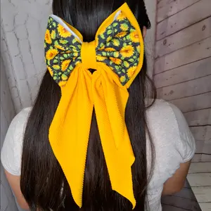 girasol coquette bow hair clip long ribbon