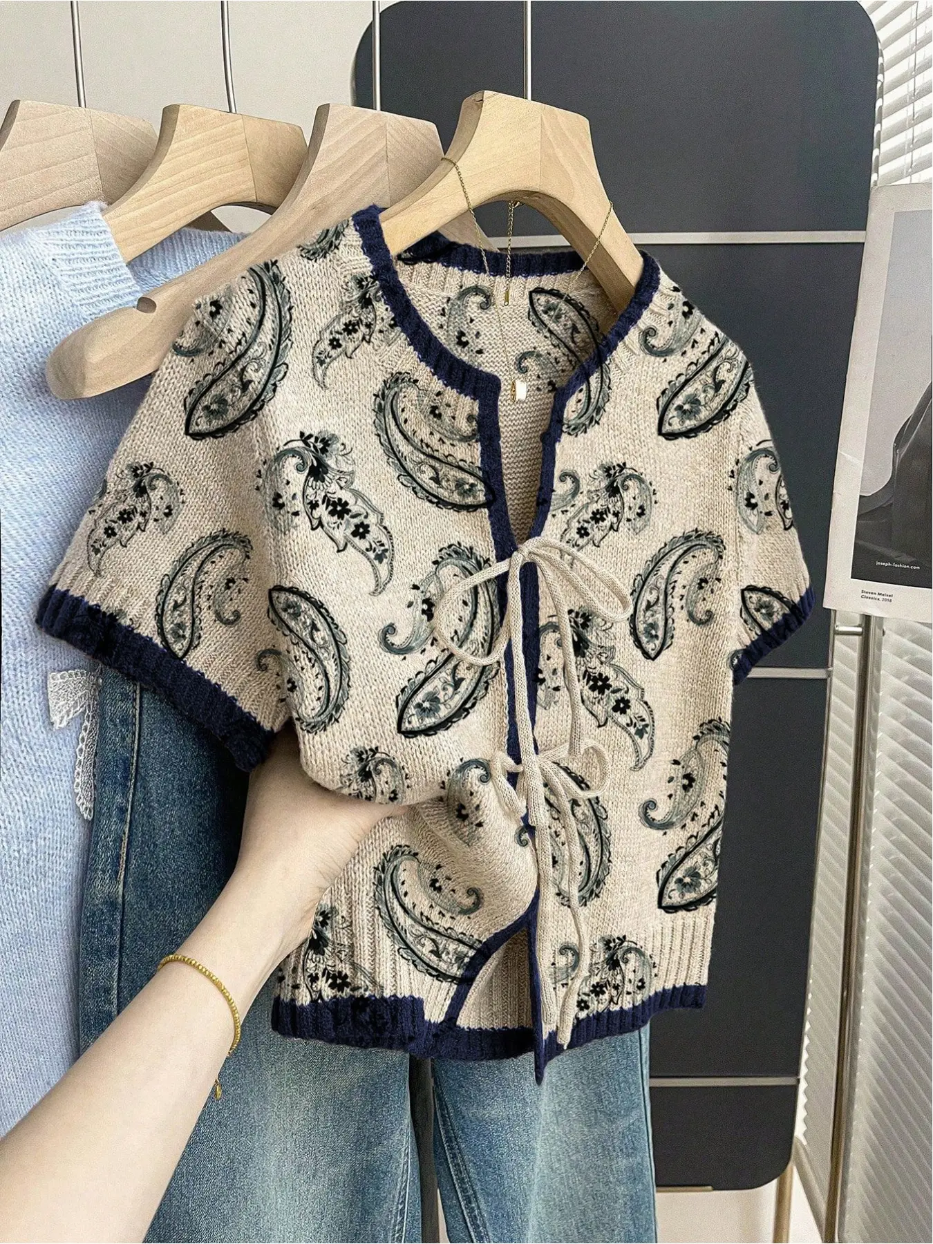 Women's khaki bohemian vacation ethnic short-sleeve knit top. Loose round neck, contrast patchwork paisley print, front tie design, contrast piping. Comfortable for spring & summer casual wear. Womenswear