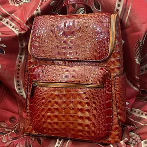 Luxury Crocodile-Embossed Leather Backpack - Rich Red Orange with Zipper Closure, Durable Design, and Elegant Finish