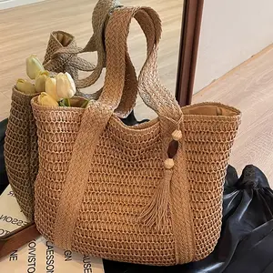 New Women's Stylish Solid-Color Hand-Woven Straw Shoulder Bag — A Summer Vacation, Travel, and Beach Tote. This versatile handbag is perfect for work, shopping, and dining out, making it an ideal gift for family and friends.