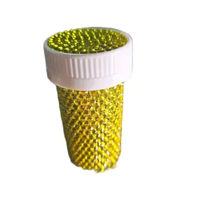 yellow bedazzled pill bottle