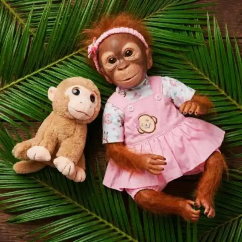 20-in Lifelike Silicone Reborn Orangutan Monkey Baby Doll, Collectible Posable Toy with Hand-Painted Details, Charming Pink Outfit, Little Gifts for Girls (3-4 Years & Ages 3+)