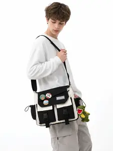 Cute Canvas Messenger Bag for Women Teen Girls, Black and Cream Crossbody Shoulder Bag with Green Dinosaur Plush Charm, Decorative Pins, Multi Pocket Flap Design, Adjustable Strap, Zipper Closure, Large Capacity School Bag for College, Work, Travel, Hallo
