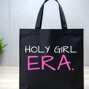 Holy Girl Era Black Canvas Tote Bag with Bold Pink and White Text for Everyday Use Lightweight Durable