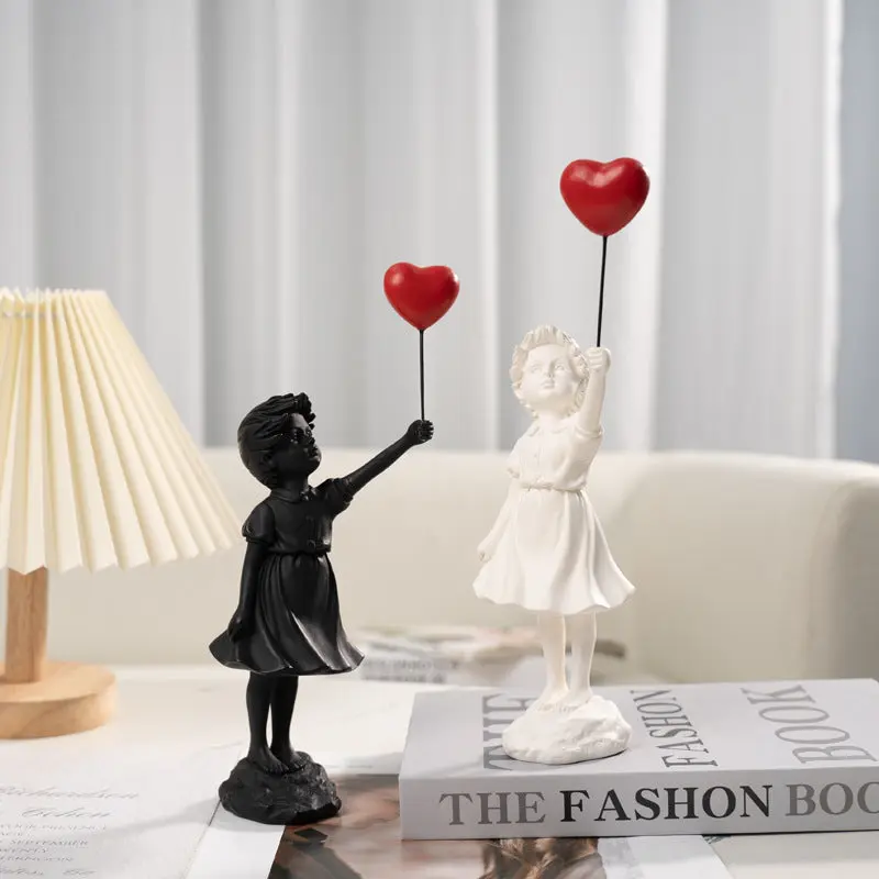Girl with Balloon Sculpture