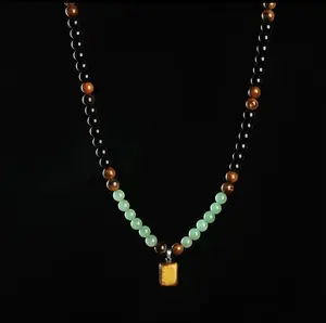 Money Attraction Necklace with Green Aventurine and Tiger Eye pendants, healing crystal stones; jewelry charms for anniversaries, vacations, and themed parties; abundance crystal bracelet; long chain; sweater chain; ideal gift jewelry for men and women.