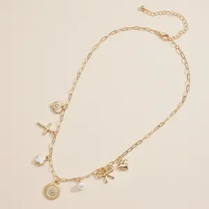 Charm Necklace with Heart, Cross, Compass Pearl, and Bow Pendants