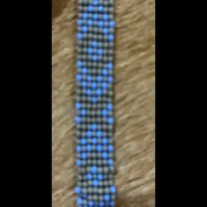 Gray and Blue Handmade Native Pattern Bracelet - Unique Design with Blue Beads on Gray Background