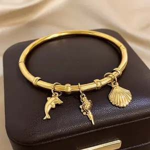 Women's 18K Gold Plated Ocean Charm Bangle Bracelet - Elegant Smooth Cuff with Dolphin, Seashell Pendants, Minimalist Coastal Mermaidcore Jewelry for Summer Cruise, Gift