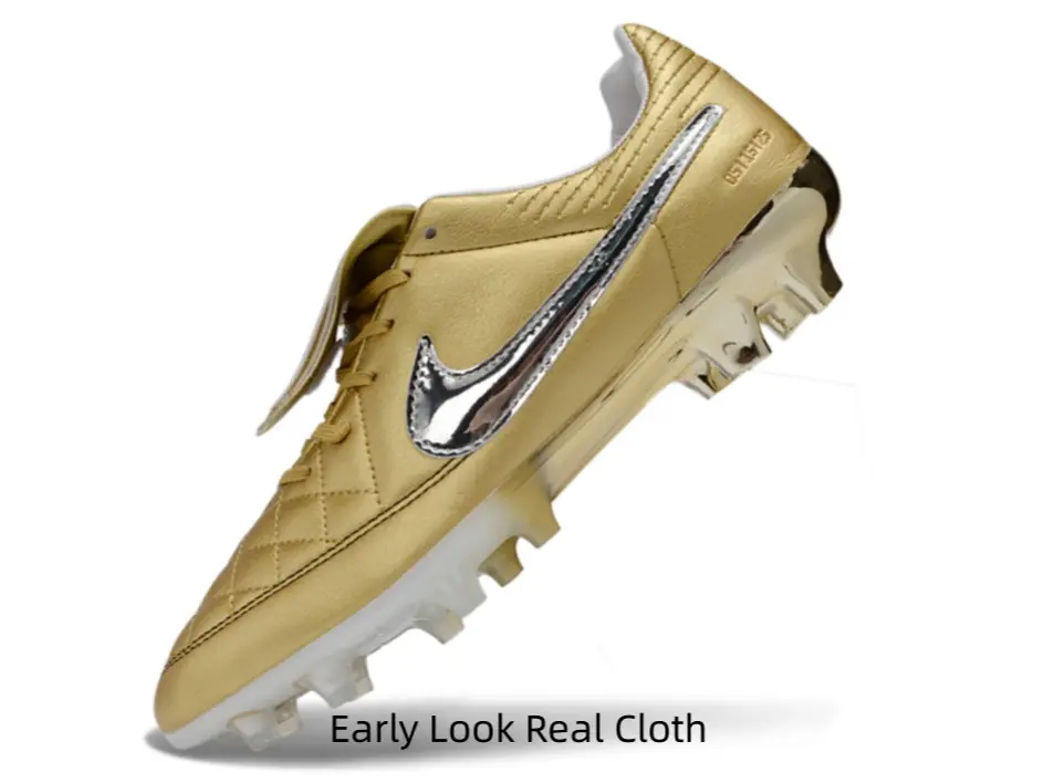 Shiny metallic gold soccer cleats, total trophy vibe for every match
