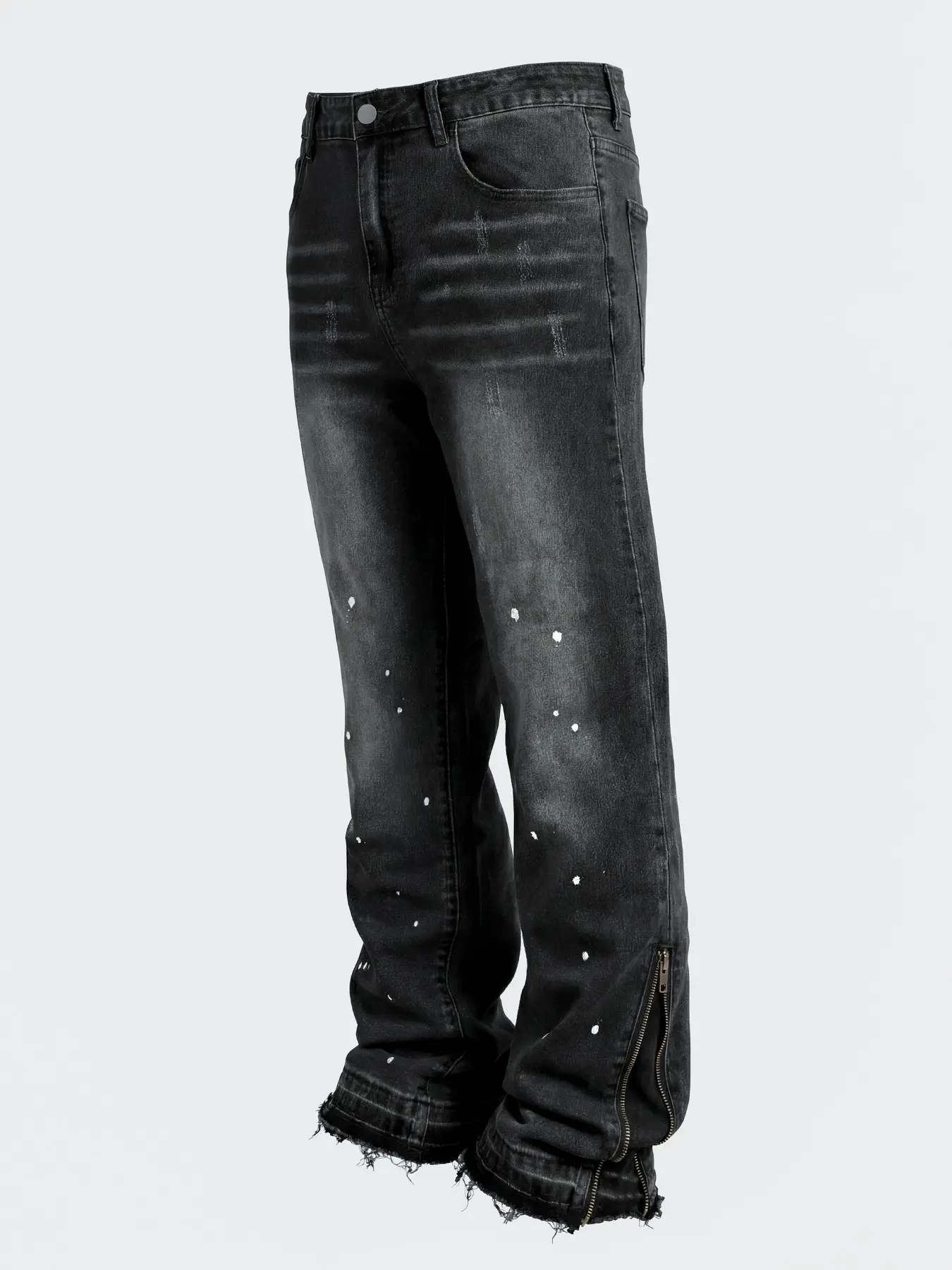 Men's black flared stretch slim-fit Ripped, Distressed Washed Denim jeans with natural waist, adjustable split hems via metal zippers on both sides, featuring splatter distressed and frayed details to create a high-street streetwear style