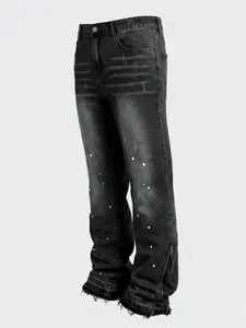Men's black flared stretch slim-fit denim jeans with adjustable split hems via metal zippers on both sides, featuring splatter distressed and frayed details to create a bold and unrestrained high-street streetwear style.
