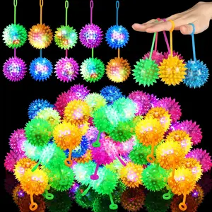 stress ball Sotiff 9 Pcs Light up Ball Spiky LED Bouncy Ball Flashing Squeaky Multicolor Puffer Toy Rubber Sensory Toy Carnival Prizes Bulk Party Favors for Teens, Adults, Children