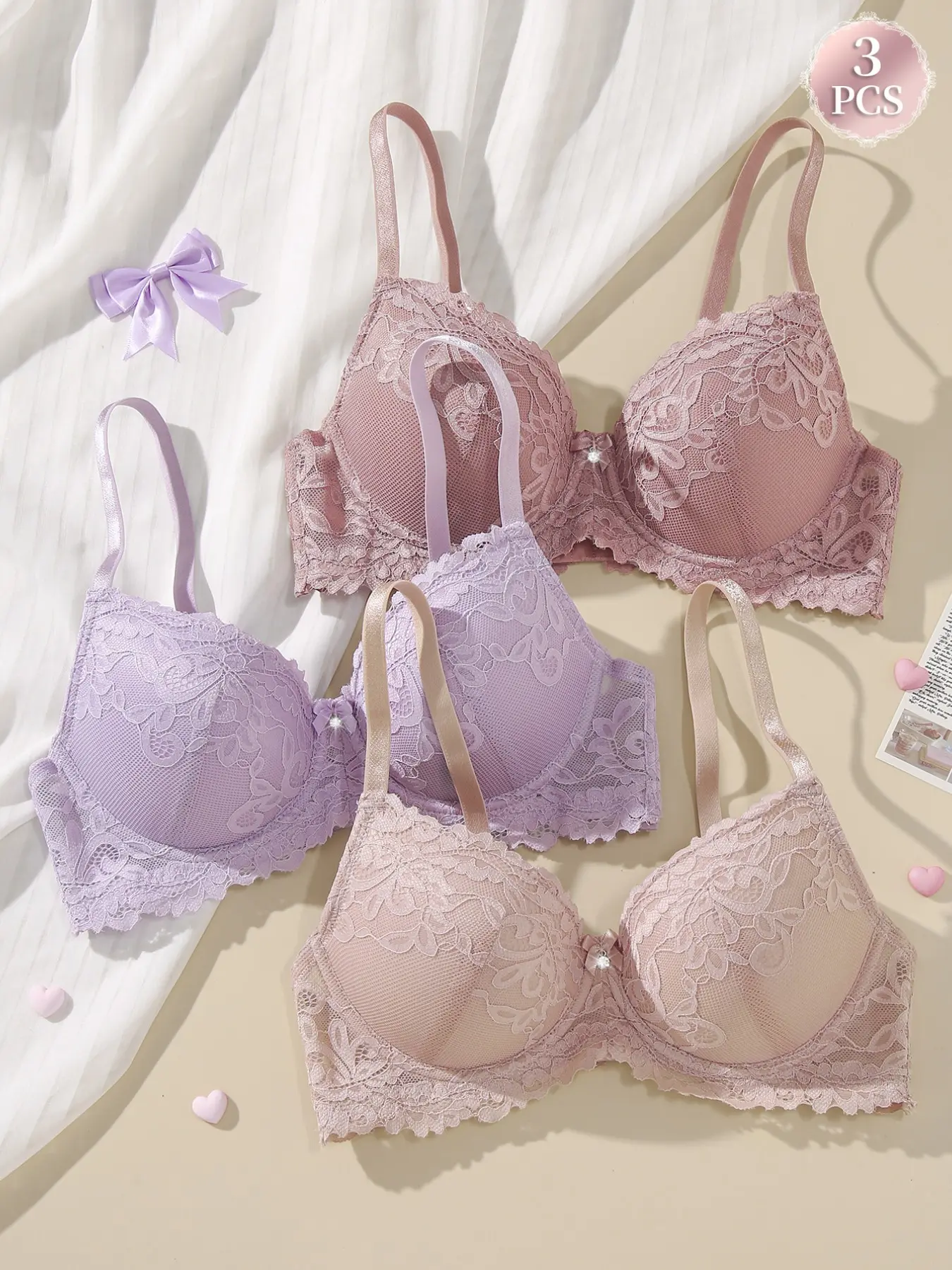 Multi-coloured ladies' floral lace bra, Strappy lace bra, with bow detailing and underwired Medium support, comfortable and breathable with adjustable straps and scalloped hemline for a flattering fit, everyday wear