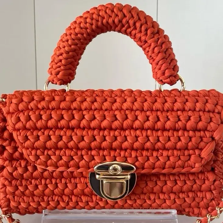 Shiela's Versatile Handcrafted Handbag - crochet Design with Gold Accents & Handle