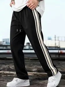 Classic Men's Casual Sport Pants, Drawstring Waist, Side Stripes, Soft Fabric, Loose Fit, All Seasons, Ideal for Gym, Streetwear, Commuting, Athleisure Style Bottoms