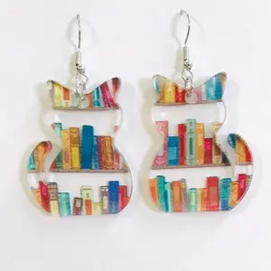 Bookshelf cat earrings