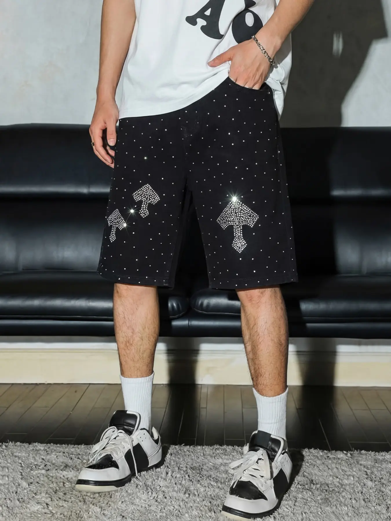 Men's black straight-cut denim jeans with silver sequins, featuring uneven sequin distribution for 3D shimmer, staggered arrangement creating dazzling light spots, a luxurious streetwear staple, Mid