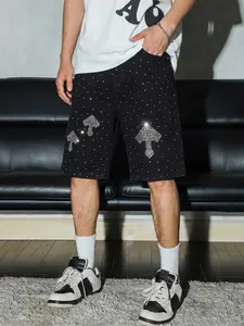 Men's black straight-cut denim jeans with silver sequins, featuring uneven sequin distribution for 3D shimmer, staggered arrangement creating dazzling light spots, a luxurious streetwear staple, Mid