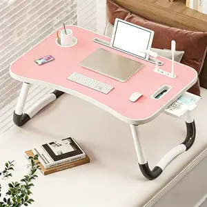 Portable folding laptop desk with 4 USB ports, a storage drawer, and cup holders. Featuring a sturdy, modern design, it’s perfect for use on beds, sofas, or the floor—ideal for working, reading, writing, and dining.