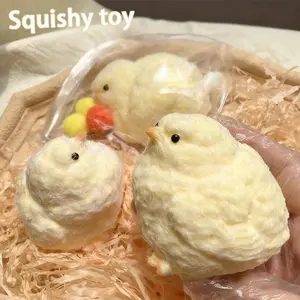 Uncompressed toy - the squeezable and soft yellow little chicken that bounces back quickly. Cute handmade toy as a birthday gift