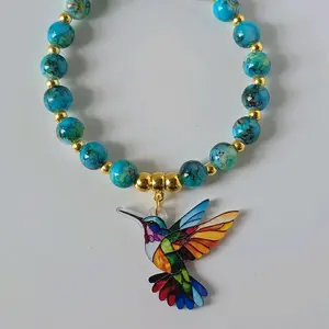 Mosaic Hummingbird Charm Bracelet with Colorful Beads and Gold Accents