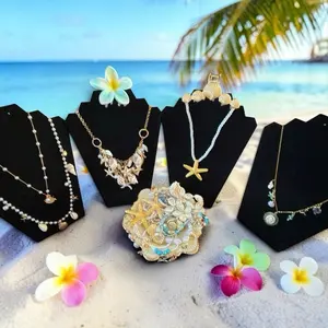 Ocean Theme Jewelry Jar - Beach, tropical vacation and summer themed costume jewelry. Collection includes charm necklaces, bracelets, earrings, and rings adorned with sea shells, pearls, gold tone charms and cameos