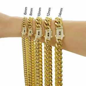 14K gold-plated Cuban chain necklace. Premium gold-plated craftsmanship with classic clear stone inlay, shiny and eye-catching.Miami Cuban chain combines classic and fashion.An ideal gift for him or her.Available in6/8/10/12/14 sizes,