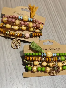 A 4-piece set of fashionable Bohemian style multi-layer life tree tassel wooden bead bead bracelet, suitable for daily wear, vacation and dating occasions, and is also a surprising and exquisite small gift.
