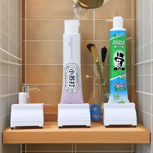 Lazy Toothpaste Squeezer Manual Rotary Dispenser Wall Mounted Toothbrush Holder Organizer Efficient Toothpaste Tube Wringer for Family Bathroom